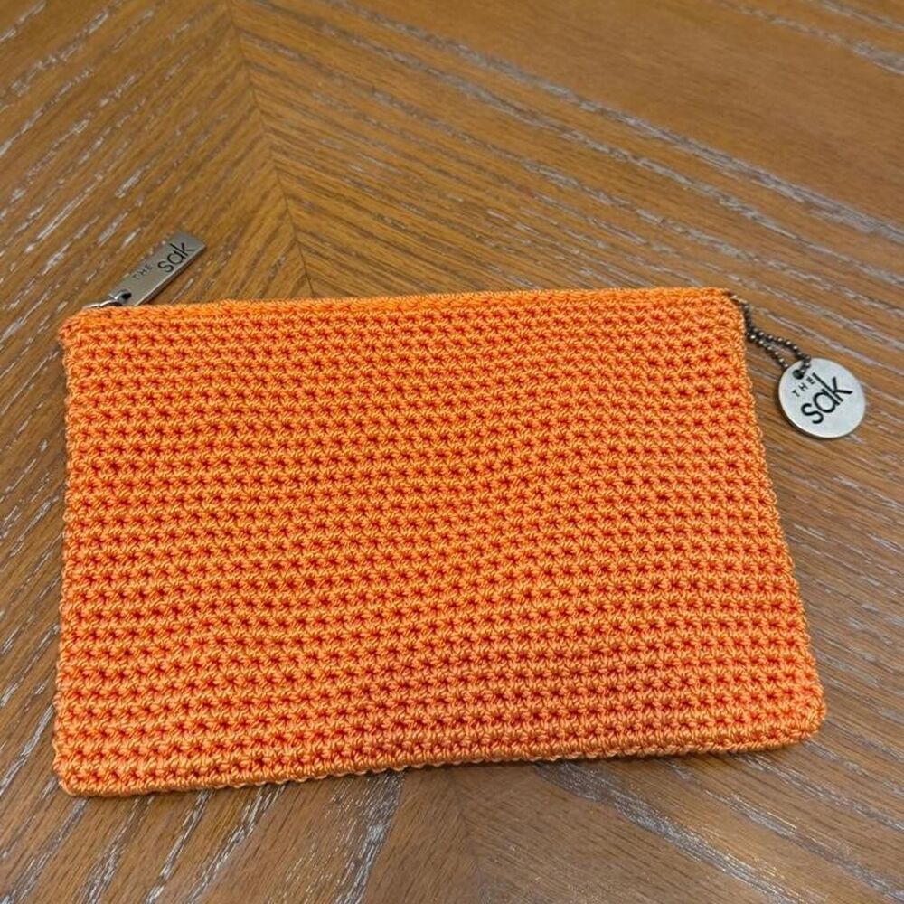 The Sak Crochet Orange Cosmetic Pouch Bag